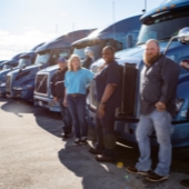 Driver Jobs - people standing next to Dot trucks