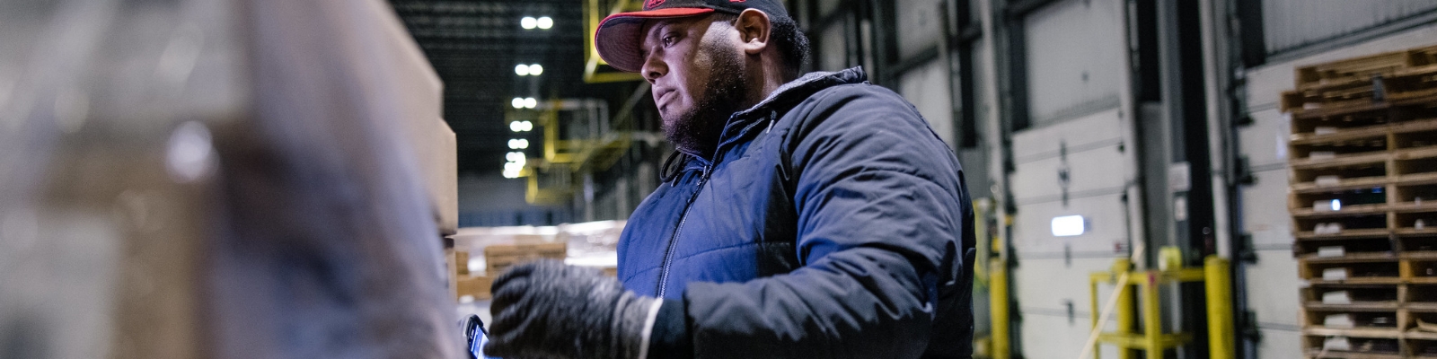 warehouse worker using device