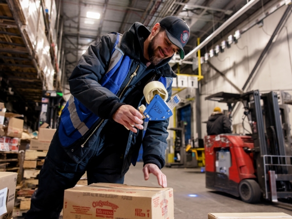 warehouse worker tapping